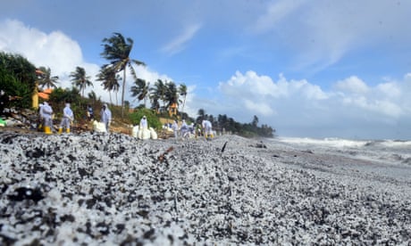 A cleanup operation on a beach covered in nurdles in May