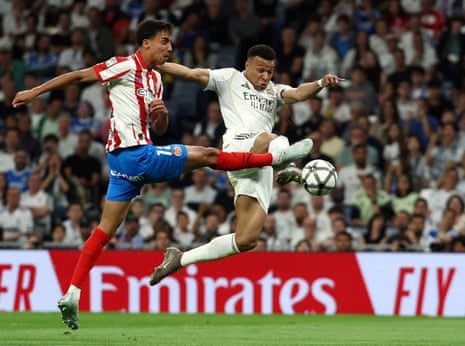 Girona’s Vitor Reis in action with Kylian Mbappé