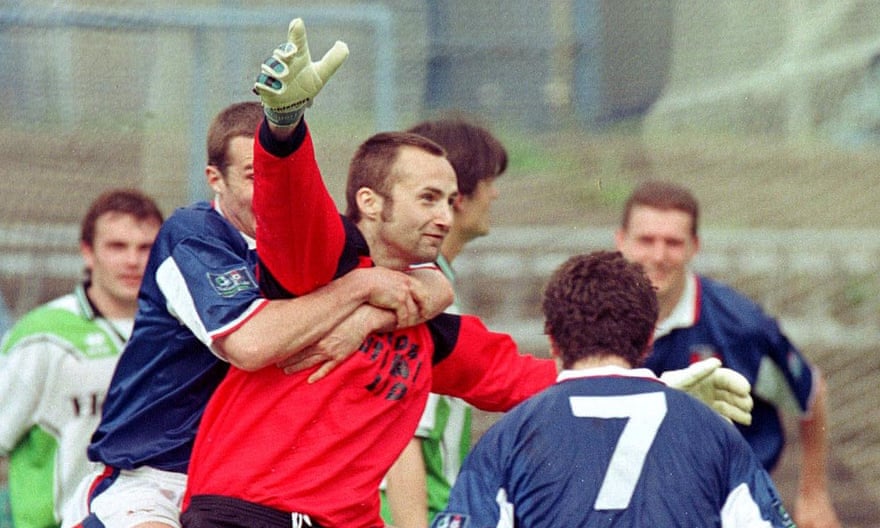 Late shows worth preserving? Carlisle goalkeeper Jimmy Glass is mobbed by teammates after his goal against Plymouth deep in stoppage time at the end of the 1998-99 season keeps his side in the league.