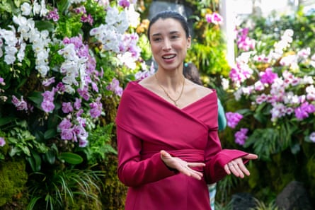 Botanical artist Lily Kwong in front of one of her installations.