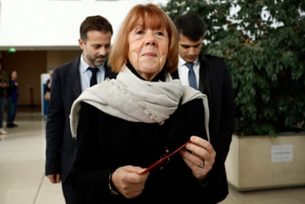 Gisèle Pelicot on her way in to court in a black coat and grey scarf.