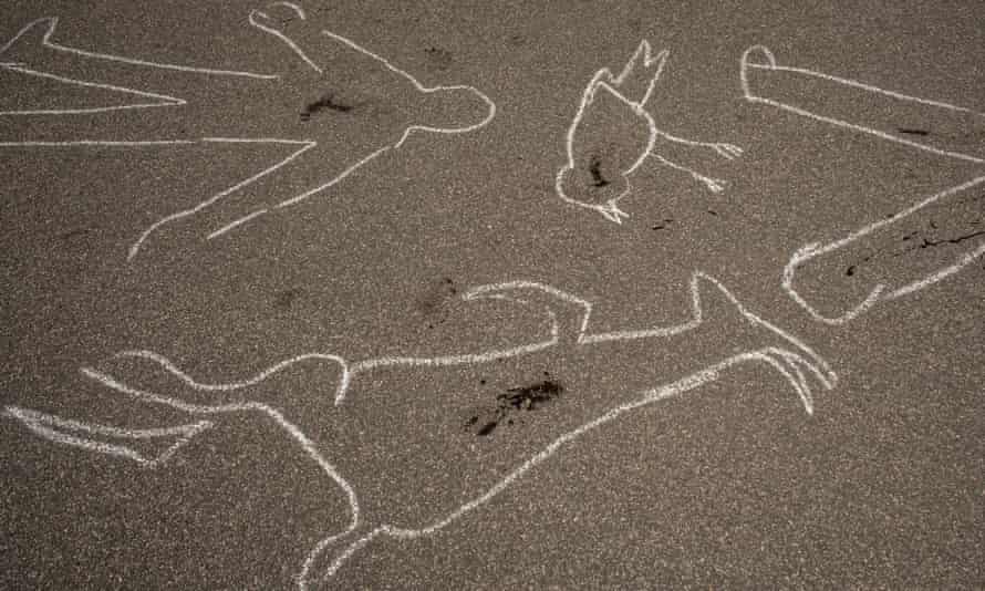 Pavement drawings as part of an Extinction Rebellion protest outside Standard Bank's head office in Johannesburg, South Africa, 12 March 2021
