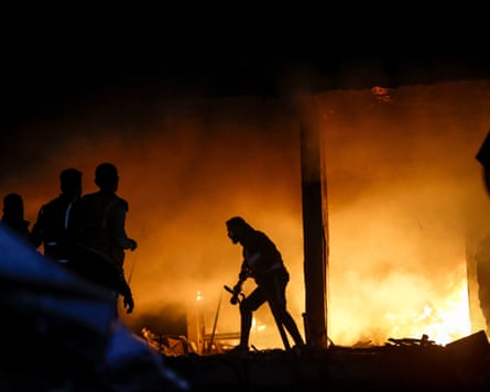 Civil defense teams conflict nan occurrence that collapsed retired successful nan building pursuing nan Israeli onslaught successful Gaza City, Gaza connected Sunday
