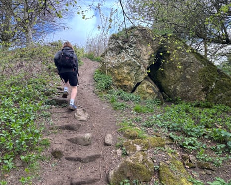 Hiker climbing trail on Hood Hill, North Yorkshire