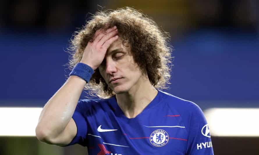 David Luiz appears dejected during the comprehensive defeat against Manchester United.