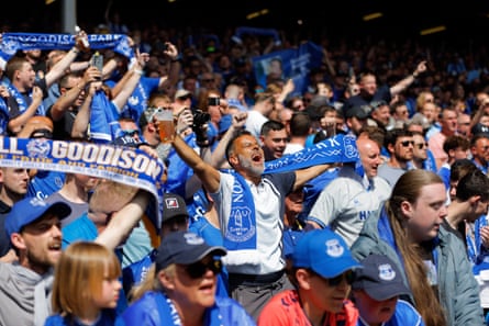 Fans sing aloud after the match at Goodison Park