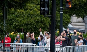 The crowd booed the president from the bottom of the steps.