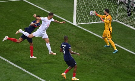 Haris Seferovic heads his and Switzerland’s second goal against France past Hugo Lloris.