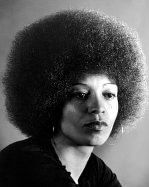 Davis in 1974, with her signature look.