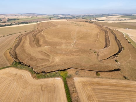 An aerial view of the dried out ground of Maiden Castle Iron Age hillfort in Dorchester, England, on 10 August 2026.
