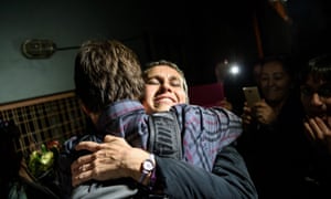 Esra Mungan hugs one of her students outside the prison after she and other academics were freed by the court.