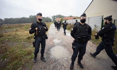 Police at the ‘Old Lidl’ site in Calais