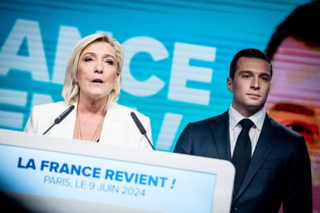 Marine Le Pen and Jordan Bardella on stage following the EU elections.