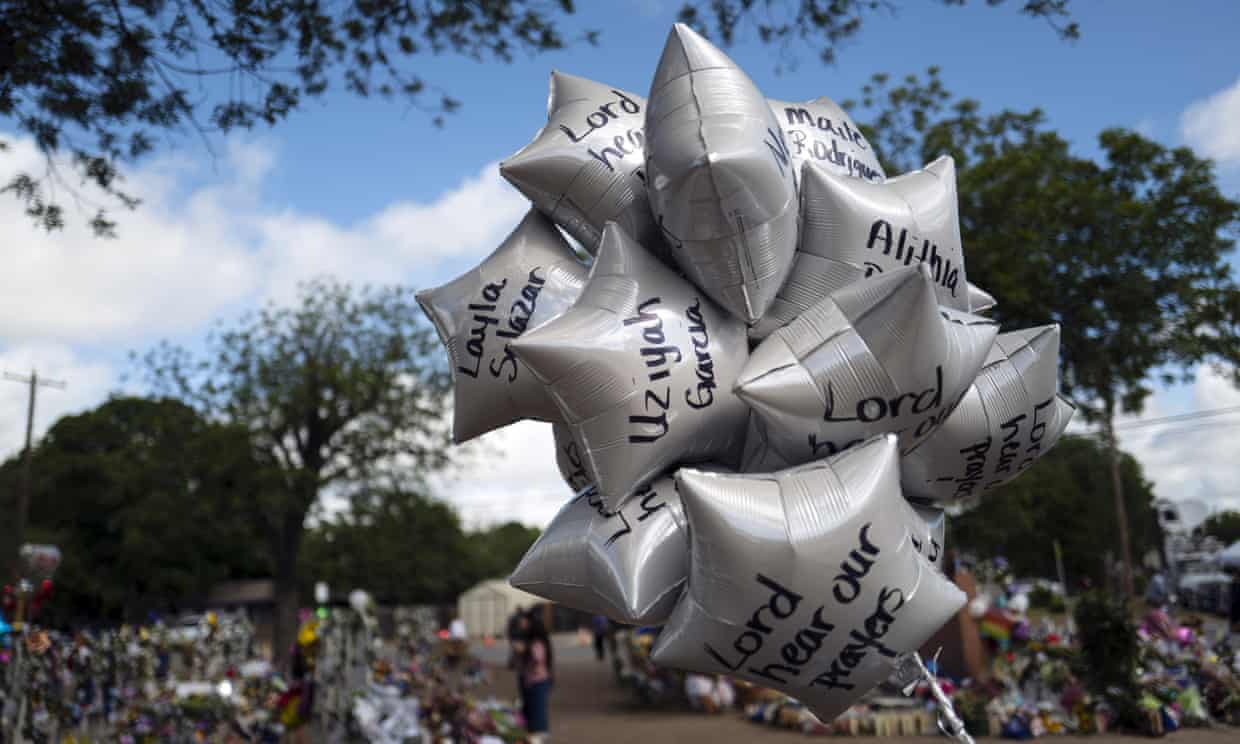 Balloons honoring the victims killed in last week's school shooting at a memorial at Robb elementary school in Uvalde, Texas Photograph: Jae C Hong/AP