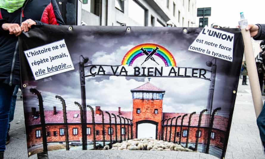 campaign poster with drawing of entrance to Auschwitz