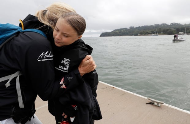 Thunberg gets a hug before she begins her voyage.