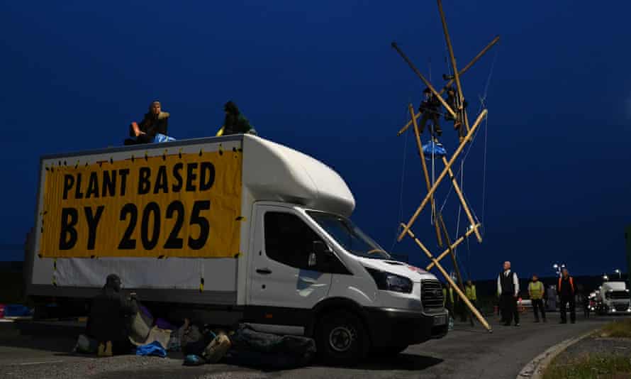 Animal Rebellion activists blockade the Arla milk factory in Aylesbury, Buckinghamshire.