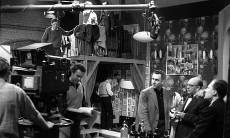 From left: Philip Saville looking at the script, Harold Pinter, Arthur Lowe and Stanley Meadows on the set of Armchair Theatre - A Night Out, in 1960.