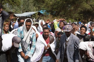People in Yubdo village, in Ethiopia’s Oromia region, mourn the death of Dinka Chala in December 2015