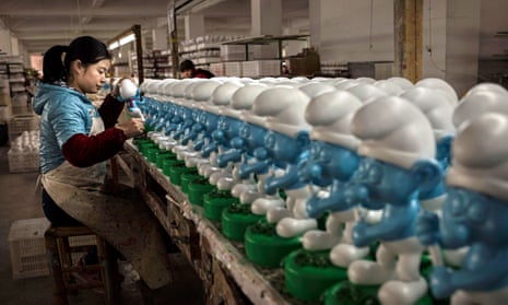 Ceramic Smurfs at a factory in Fujian province, China. The practice of taking money out of the country is known as ‘Smurfing’.