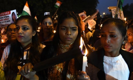 Protesters take part in a candlelight march to campaign for an end to violence against women in New Delhi, India.
