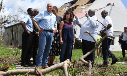 Vice President Mike Pence and his wife Karen Pence view storm damage in Christiansted, St Croix.