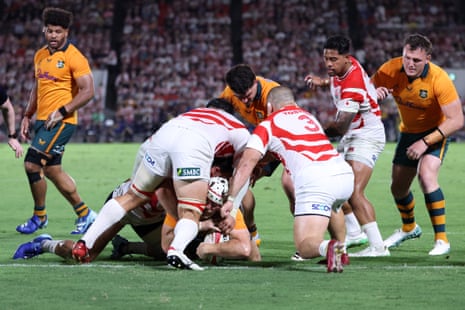 Fraser McReight scores a try for Australia against Japan