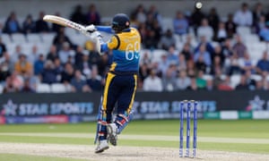 Angelo Mathews from Sri Lanka passes the ball.