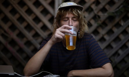 Visual artist Blake Kendall enjoys a beer at the Crix.