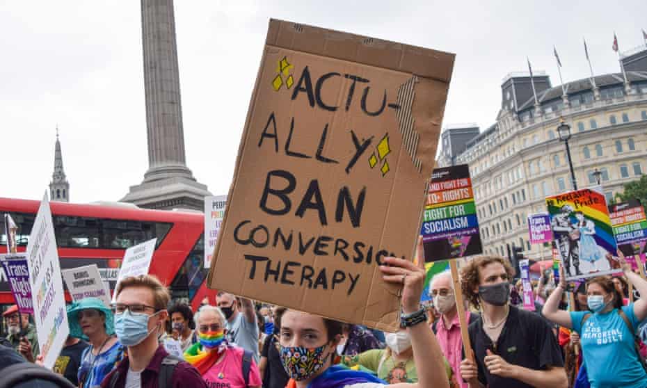 A protester holds up a sign during a Reclaim Pride protest last year.
