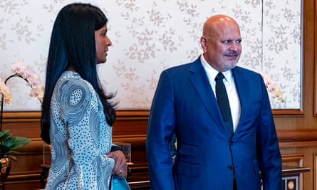 Dato Shyamala Alagendra stands beside Karim Khan