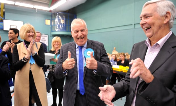Conservative Dick Madden celebrates after retaining his seat on Essex county council.