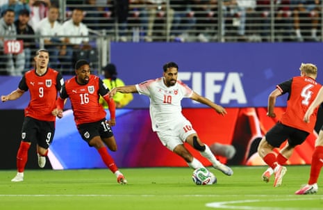 Jordan's Mousa Al Tamari in action with Austria's Phillip Mwene