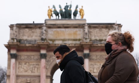 People walking in Paris. France has announced Covid measures will be relaxed at the beginning of February.