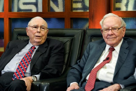 two very yold white men in suits sit in chairs