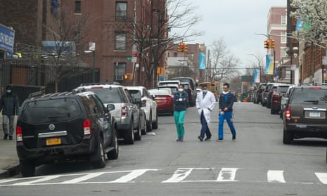 Healthcare workers are seen with face masks in Brooklyn, New York, United States on 25 March, 2020.