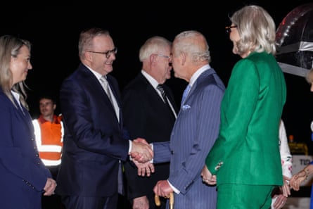 Britain’s King Charles shakes hands with Australian prime minister Anthony Albanese on his arrival into Sydney.