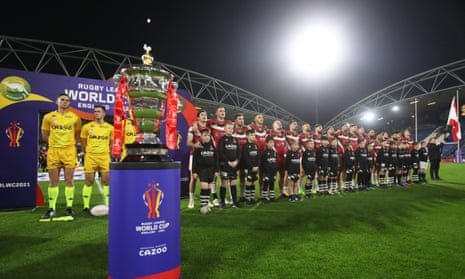 The Lebanon players line up behind the Rugby League World Cup trophy ahead of their ahead of their quarter-final match against Australia.