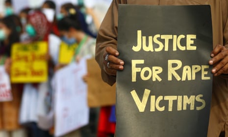 A woman holds a sign saying 'Justice for rape victims' at a protest in Karachi in September 2020.