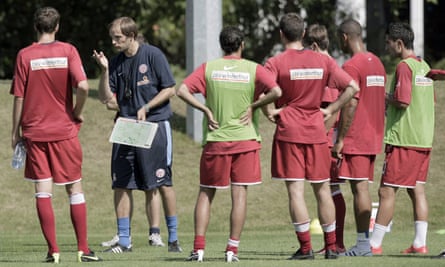 Thomas Tuchel (second left) shortly after taking over as Mainz head coach in August 2009.
