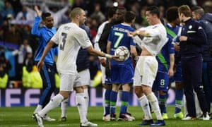 Real Madrid’s Pepe gives Ronaldo the match ball