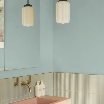 Corner of a bathroom with a deco-style lamp hanging over a squared-off basin and Dusky Teal colour paint