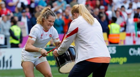 Ellie Kildunne celebrates by playing the drums after England’s victory over France.