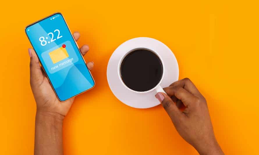 woman checking smartphone for email