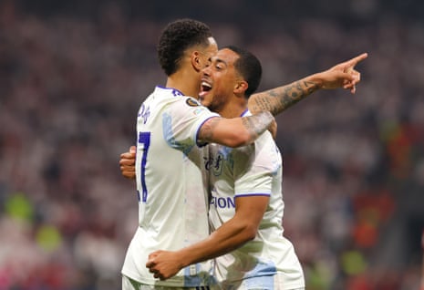 Aston Villa's Morgan Rogers celebrates scoring his side's third goal with Youri Tielemans