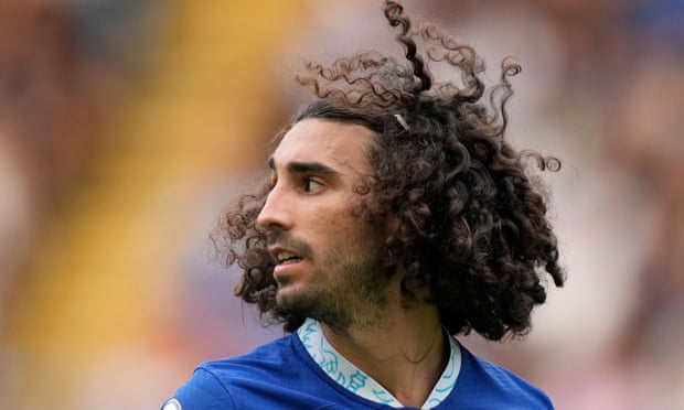 Marc Cucurella's locks in full flow.