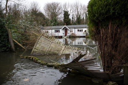 A flooded garden by a river
