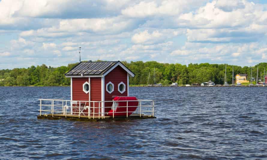 Floating cabin on a lake, entrance to The Utter Inn, at malaren Vasteras Sweden