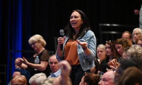 A concerned citizen asks a question during a youth crime community forum in Toowoomba