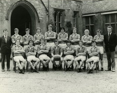 The Sherborne 1st XV rugby team from 1977, flanked by Mike Davis and Phil Jones.